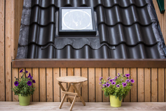 Foto Ryan Baugestaltung Anbau Francop Edelholzterrasse mit Holhocker