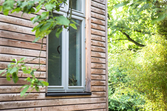 Foto Ryan Baugestaltung Anbau Volksdorf außen mit Holzwand und großem Fenster